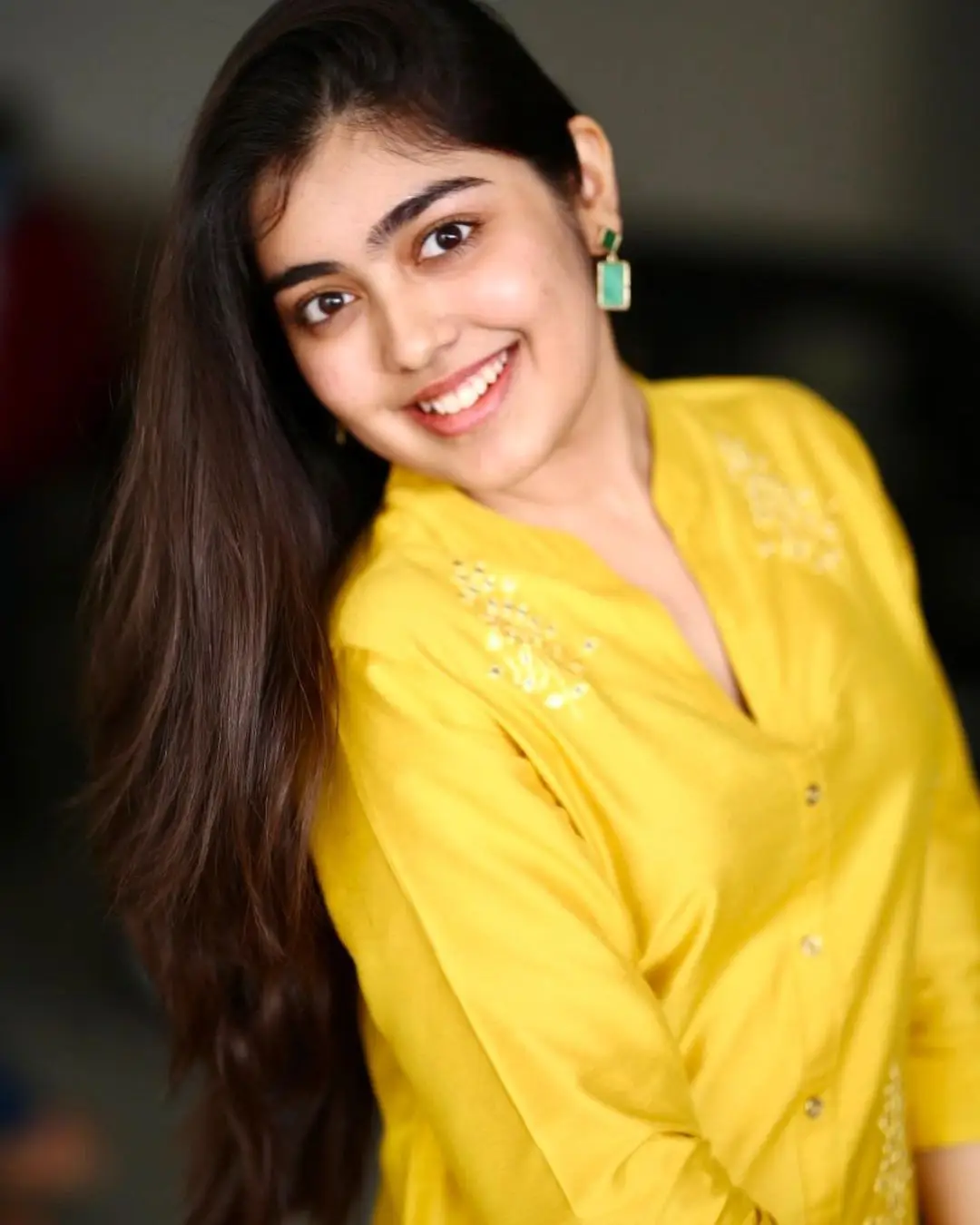 Gargeyi Yellapragada Smiling Face Long Hair Yellow Dress